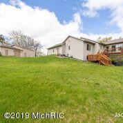 5798 Whites Bridge Road Belding, MI 48809 - Photo 25 of 28 Whitesbridge view of house and polebarn