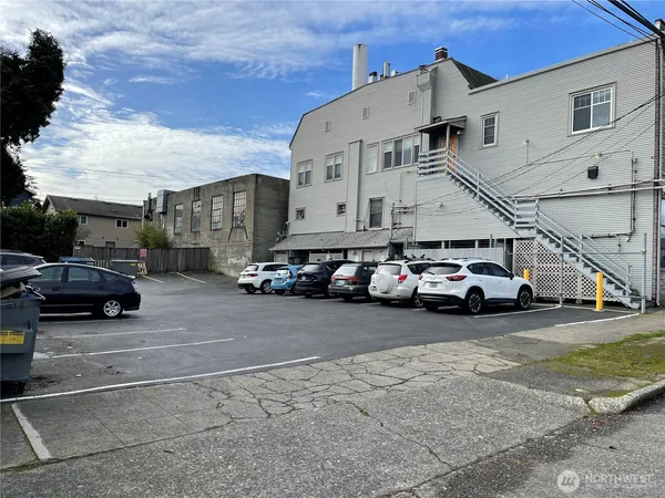 a view of a cars parked in front of a building