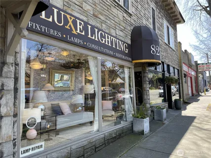 a view of a building with sitting area