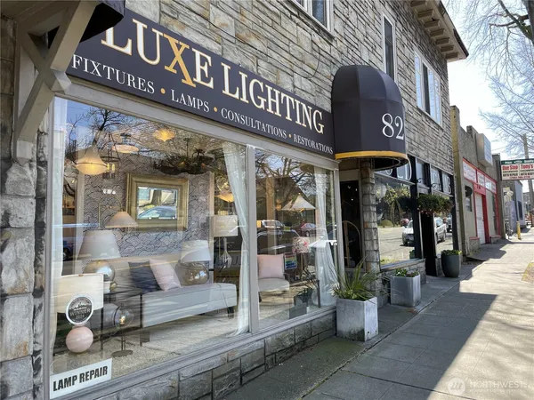a view of a building with sitting area