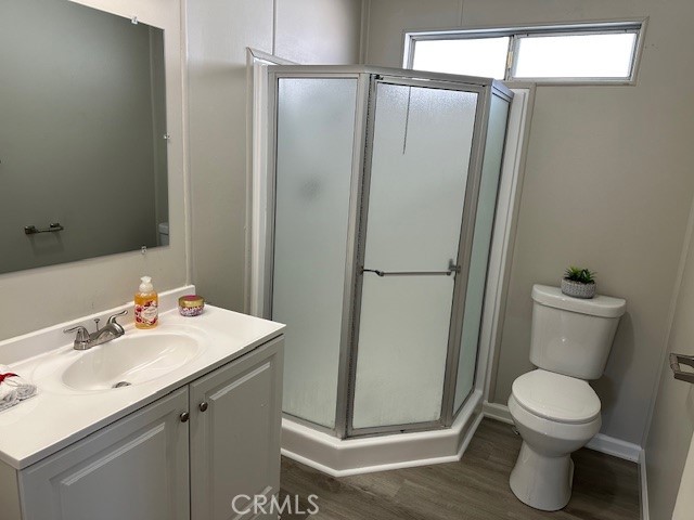 881 North Lake Street, Unit 204 Hemet, CA 92544 - Photo 8 of 10 a bathroom with a sink toilet and shower
