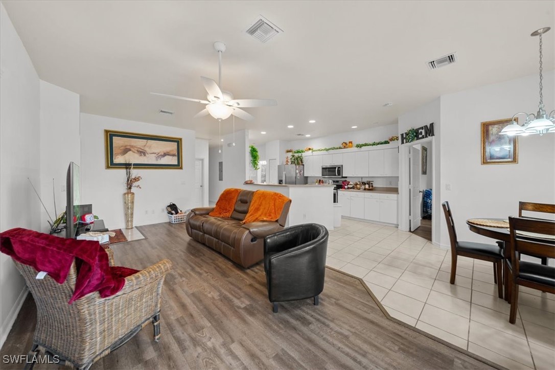 20025 Lake Vista Circle, Unit 6B LaBelle, FL 33935 - Photo 12 of 36 a living room with furniture and kitchen view