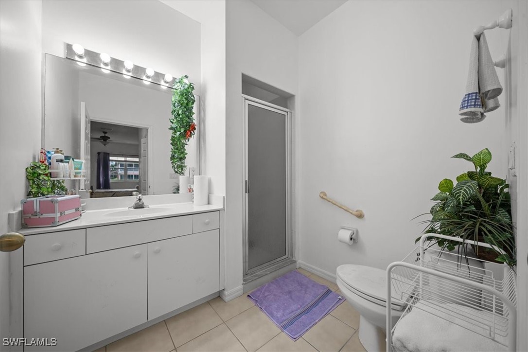 20025 Lake Vista Circle, Unit 6B LaBelle, FL 33935 - Photo 25 of 36 a bathroom with a sink and mirror