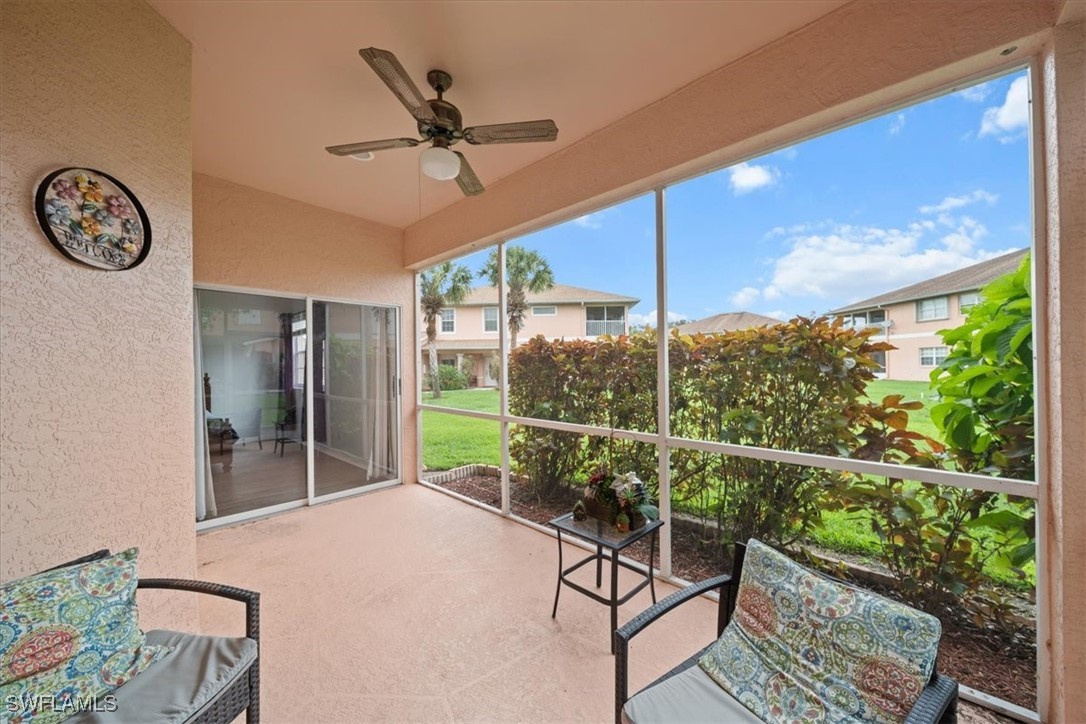 20025 Lake Vista Circle, Unit 6B LaBelle, FL 33935 - Photo 28 of 36 a view of a chairs and table in a patio