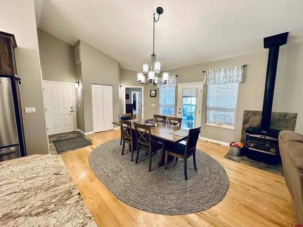 a view of a dining room with furniture