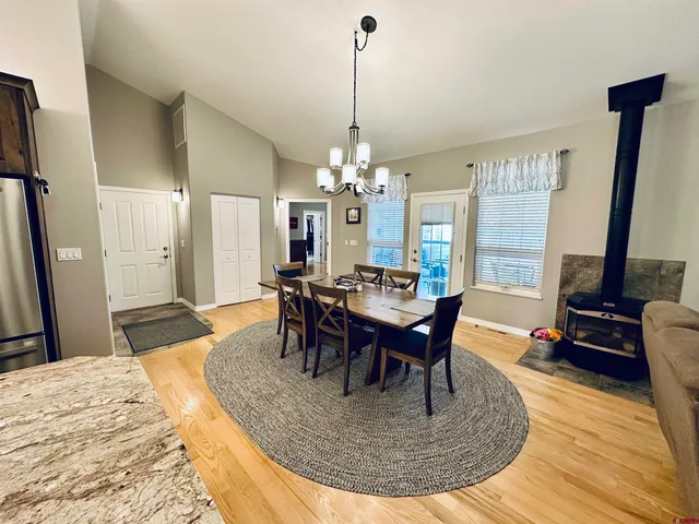 a view of a dining room with furniture