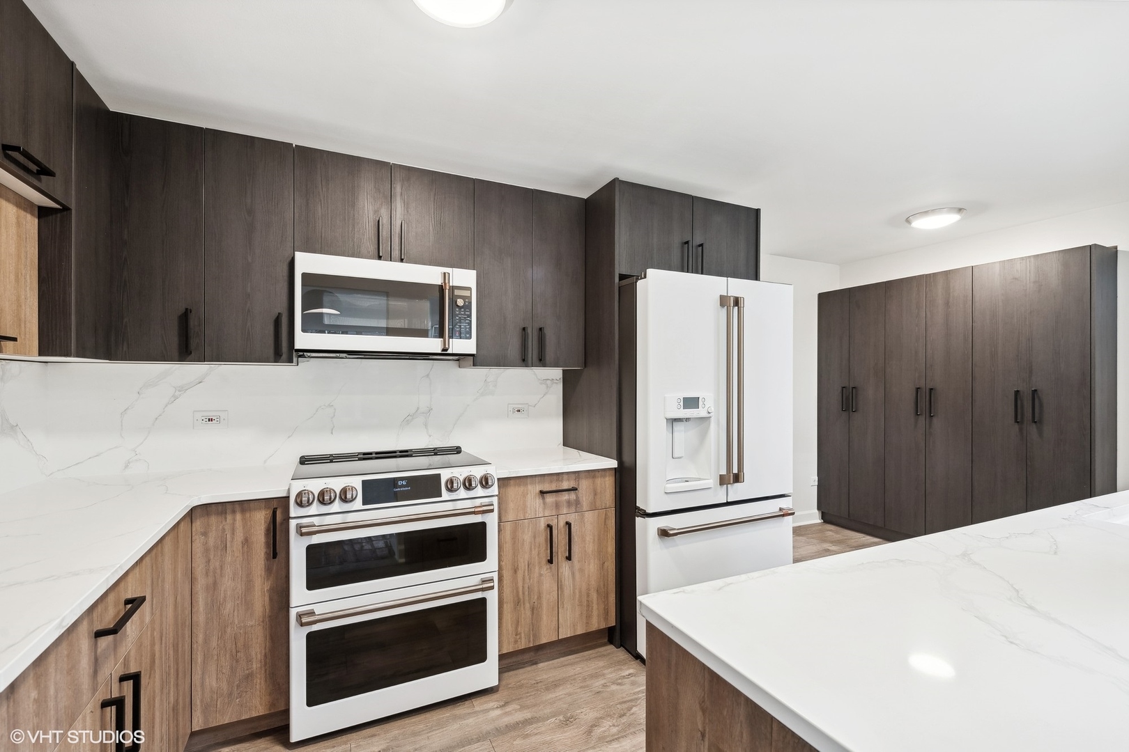 688 East Old Elm Road Lake Forest, IL 60045 - Photo 14 of 40 a kitchen with stainless steel appliances a stove microwave and refrigerator