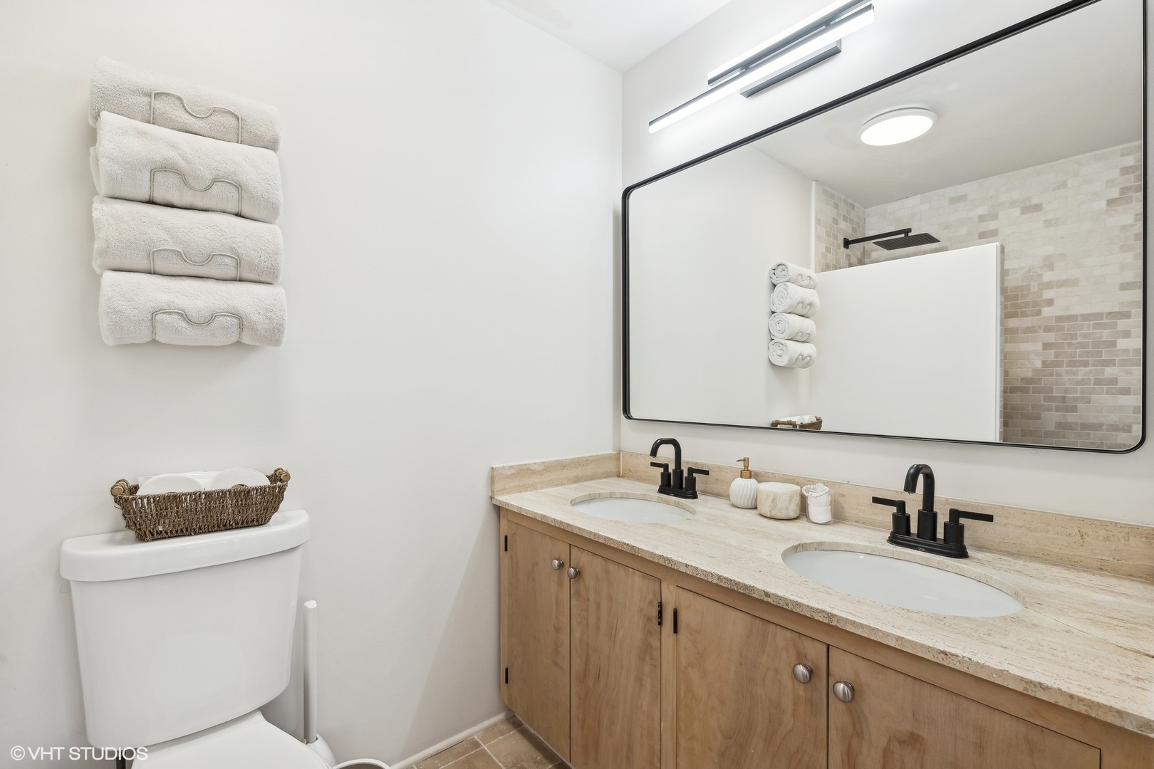 688 East Old Elm Road Lake Forest, IL 60045 - Photo 23 of 40 a bathroom with a granite countertop sink mirror and vanity