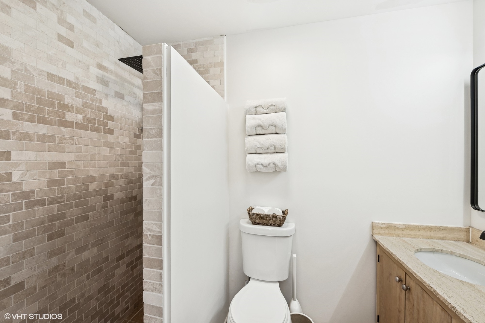 688 East Old Elm Road Lake Forest, IL 60045 - Photo 24 of 40 a white toilet sitting next to a bathroom sink