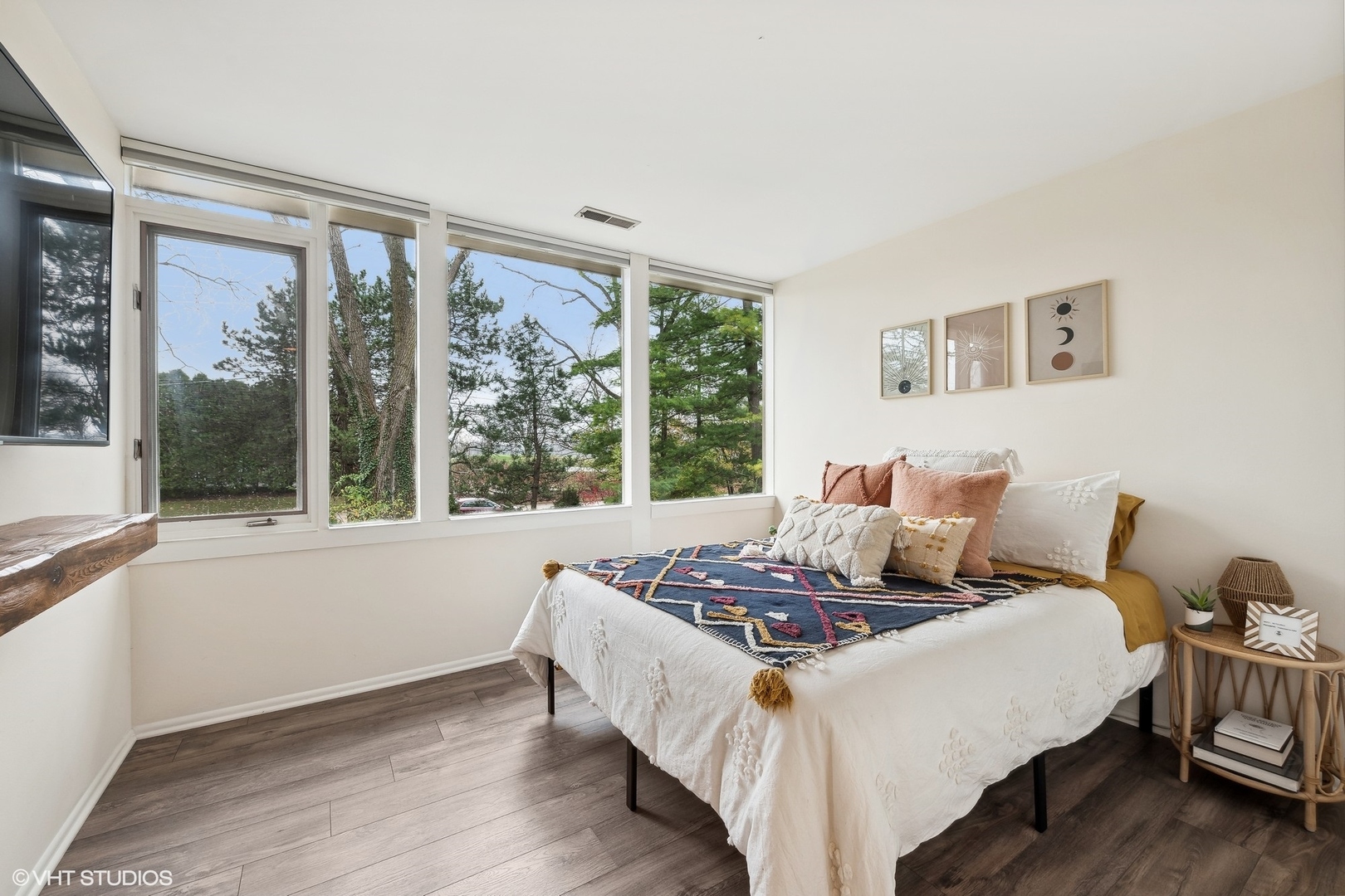 688 East Old Elm Road Lake Forest, IL 60045 - Photo 27 of 40 a bedroom with a bed and wooden floor