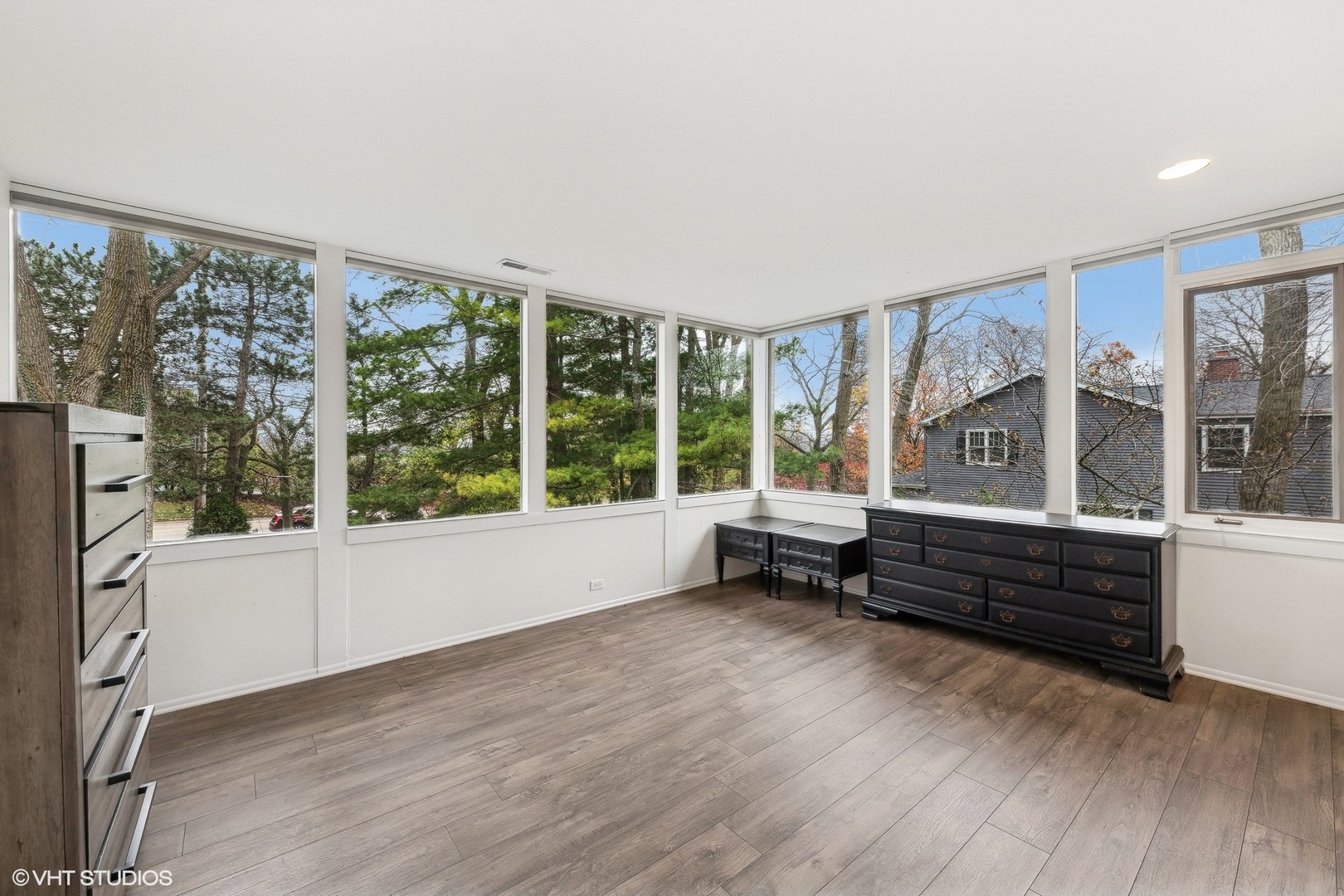688 East Old Elm Road Lake Forest, IL 60045 - Photo 29 of 40 an empty room with wooden floor and windows