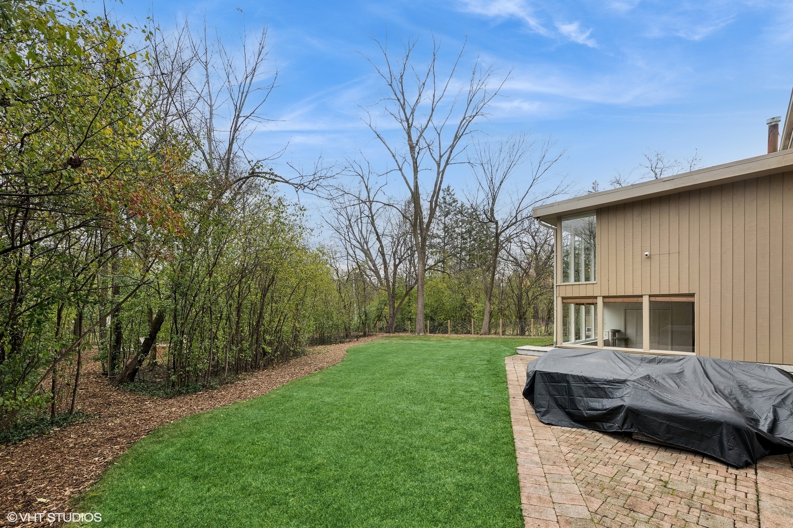688 East Old Elm Road Lake Forest, IL 60045 - Photo 33 of 40 a backyard of a house with seating space