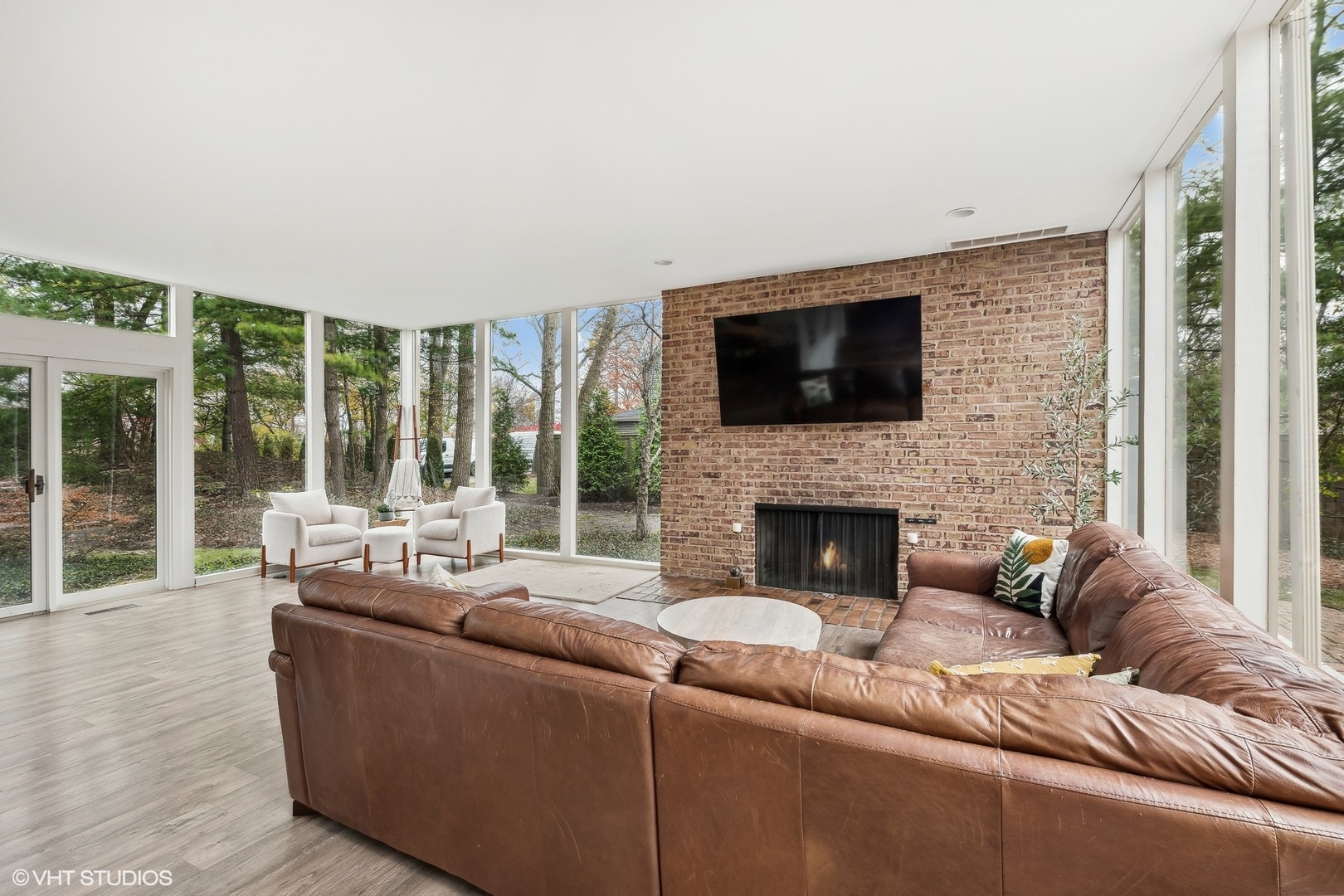 688 East Old Elm Road Lake Forest, IL 60045 - Photo 4 of 40 a living room with fireplace furniture and a flat screen tv