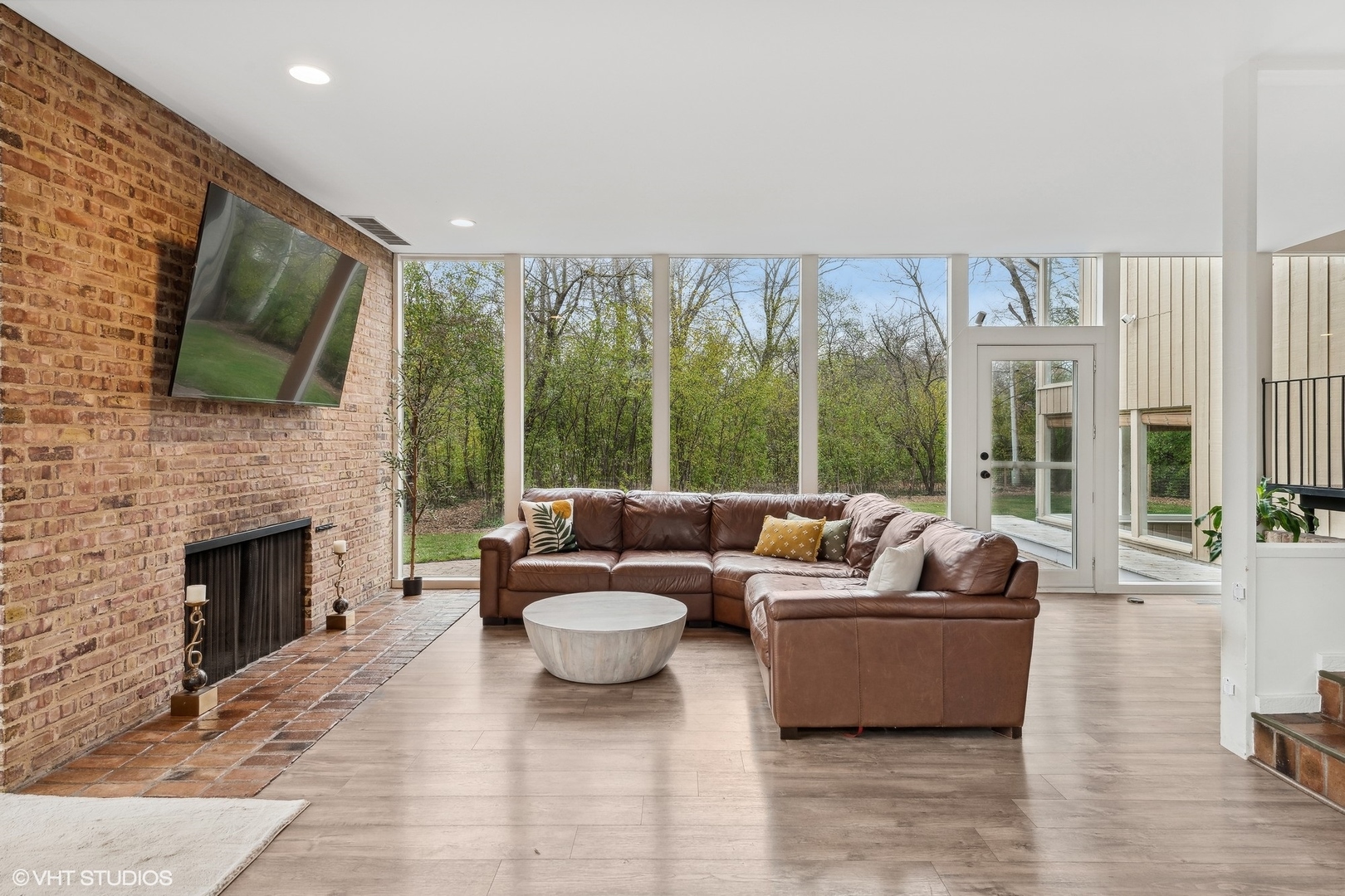688 East Old Elm Road Lake Forest, IL 60045 - Photo 7 of 40 a living room with fireplace furniture and a flat screen tv