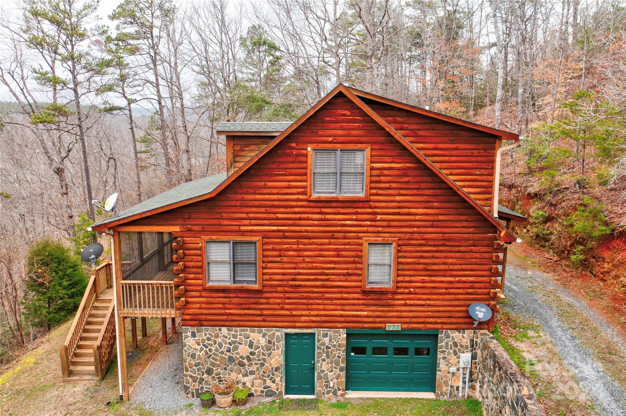273 Sasafras Ridge Rutherfordton, NC 28139 - Photo 1 of 41 a front view of a house with a yard