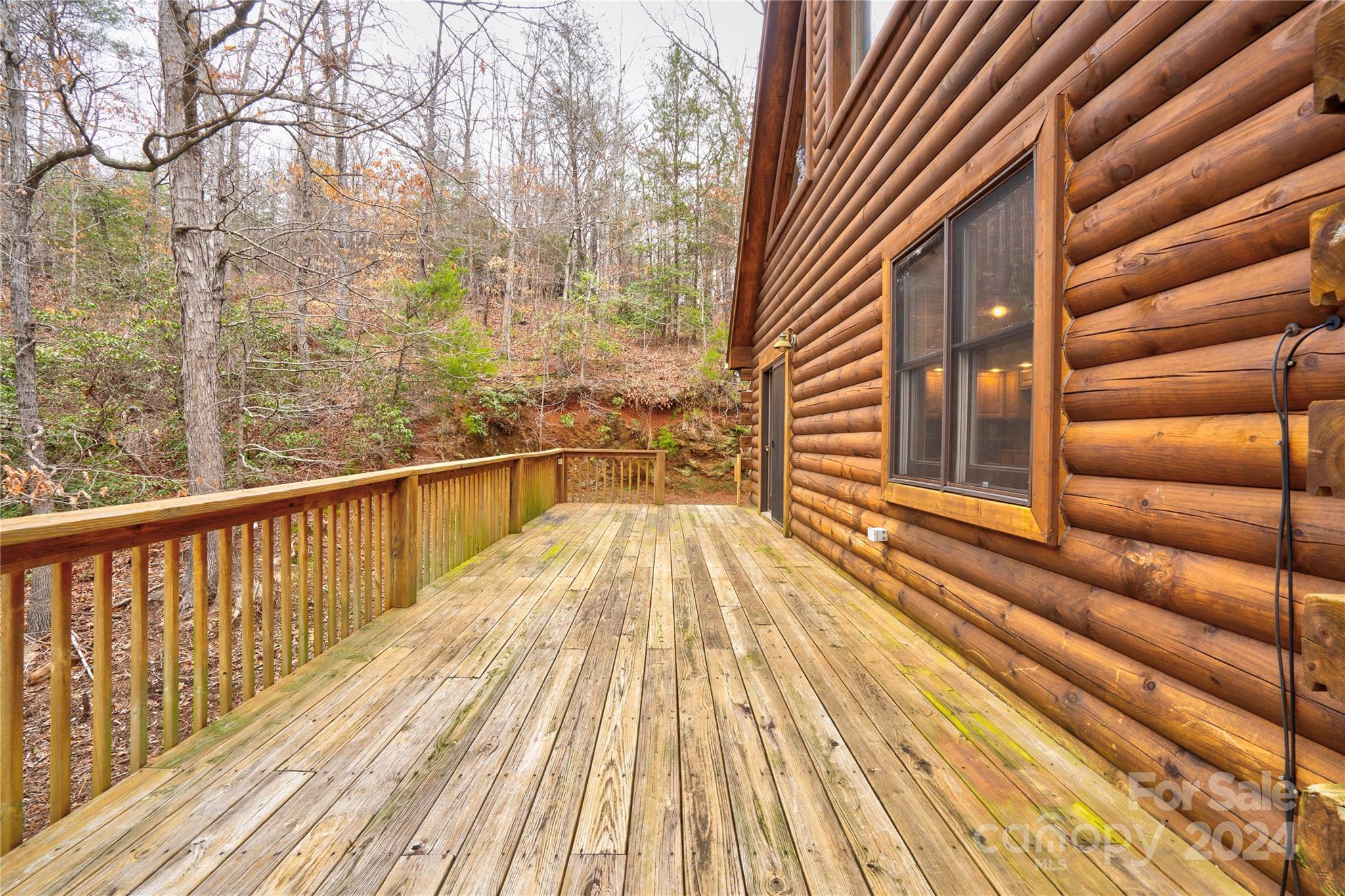 273 Sasafras Ridge Rutherfordton, NC 28139 - Photo 13 of 41 a view of a balcony with wooden floor and fence