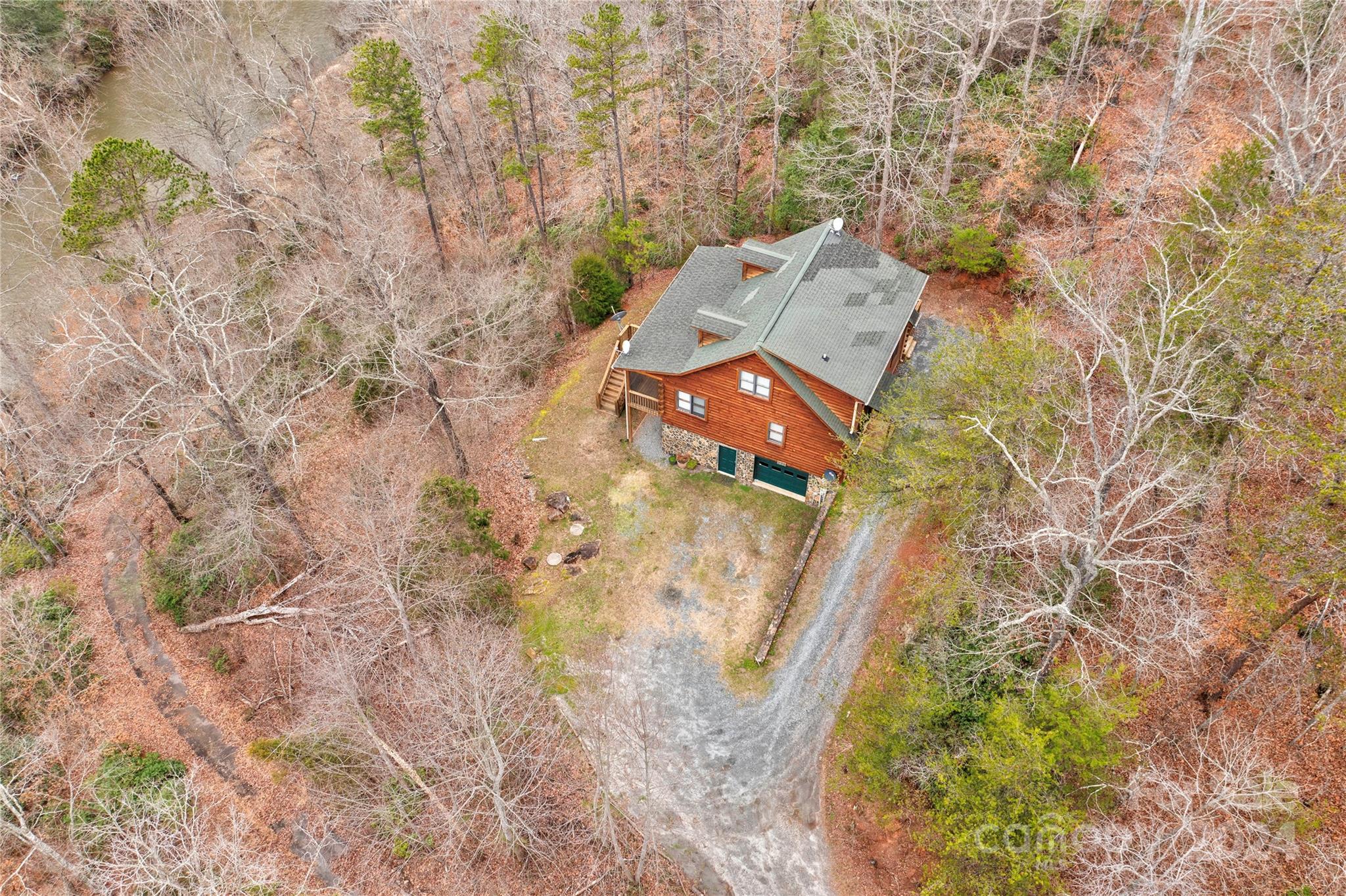 273 Sasafras Ridge Rutherfordton, NC 28139 - Photo 2 of 41 a aerial view of a house with a yard and large tree