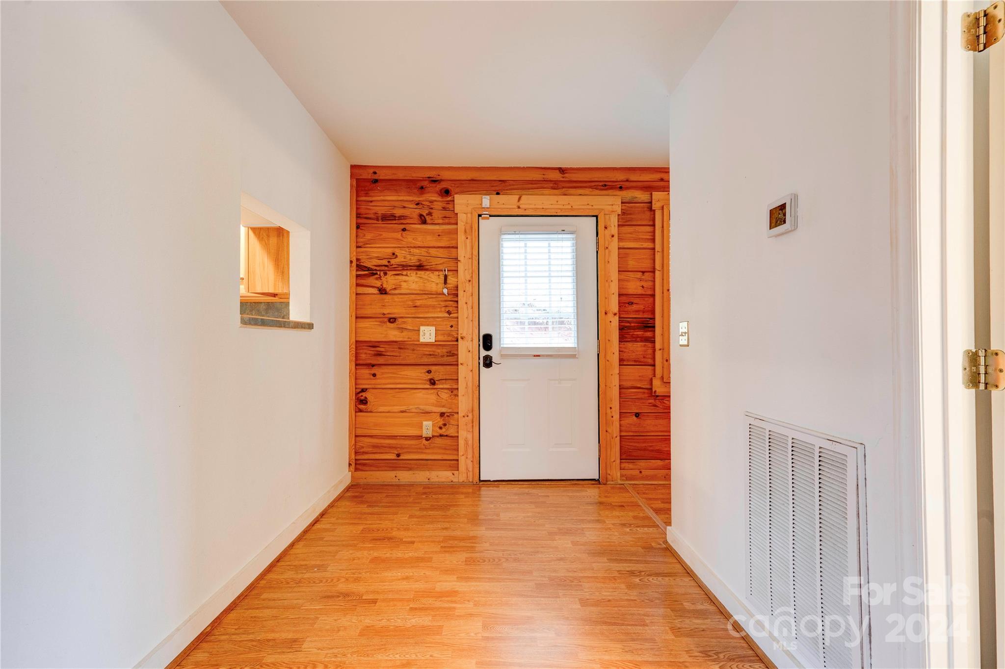 273 Sasafras Ridge Rutherfordton, NC 28139 - Photo 23 of 41 a view of a hallway with wooden floor and entryway