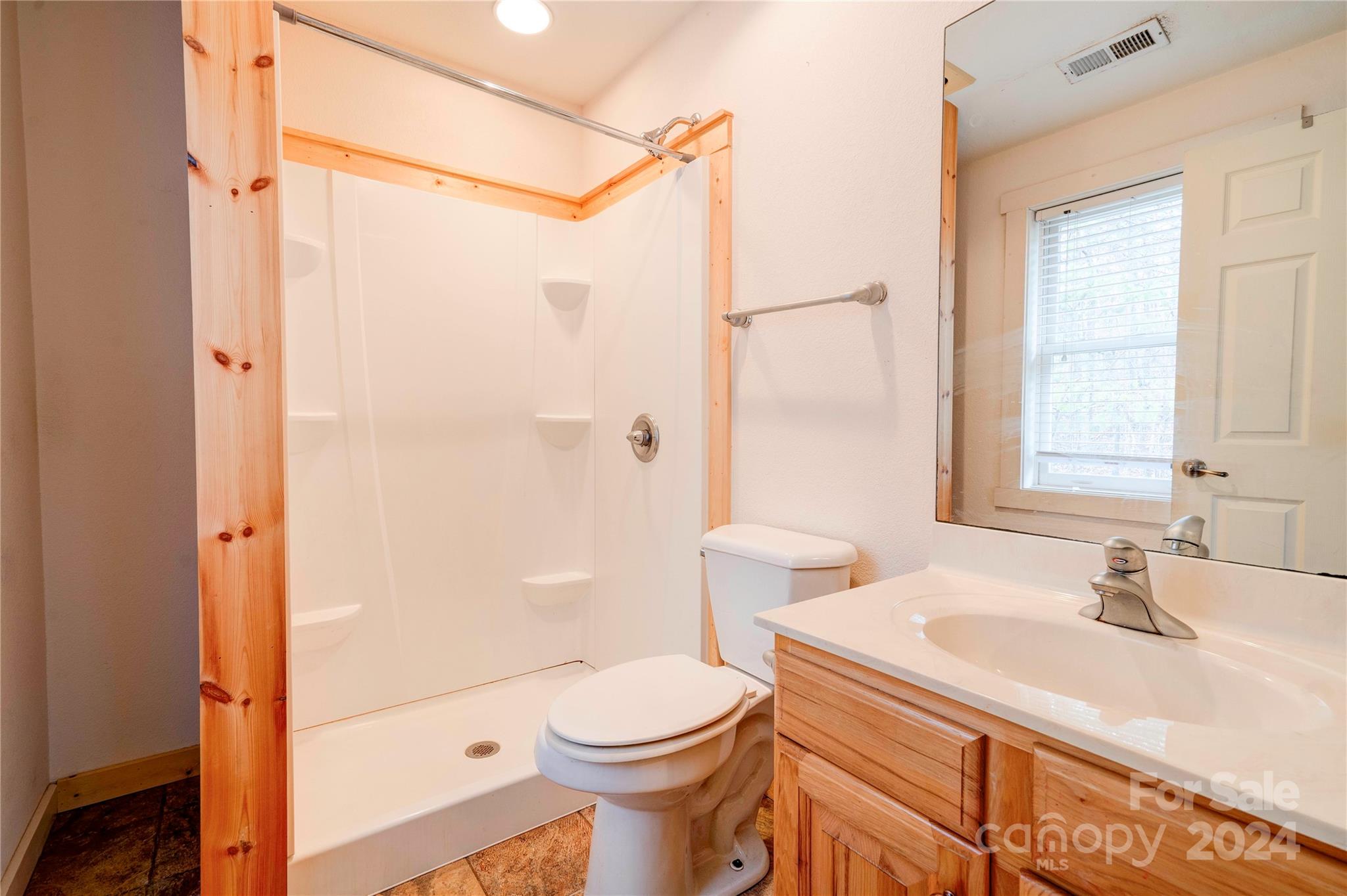 273 Sasafras Ridge Rutherfordton, NC 28139 - Photo 38 of 41 a bathroom with a sink toilet and shower