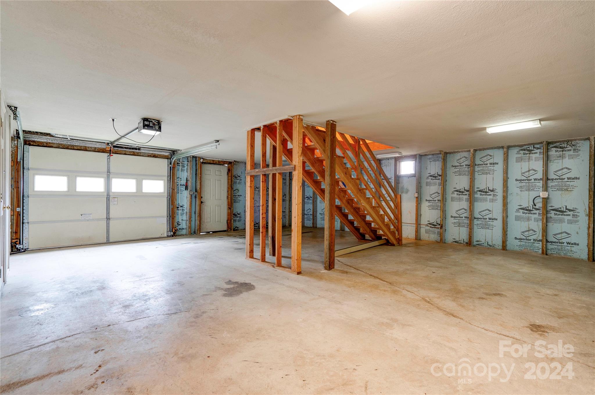 273 Sasafras Ridge Rutherfordton, NC 28139 - Photo 41 of 41 a view of a room with stairs and a ceiling fan
