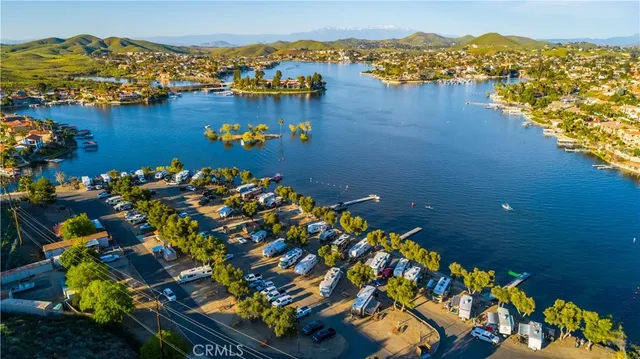 a view of a patio with couches and a fire pit