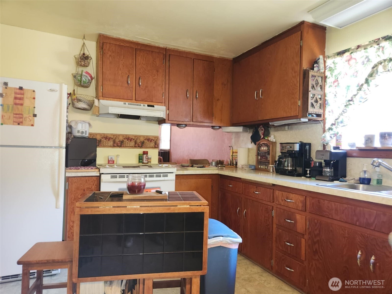 160 Gharet Road Randle, WA 98377 - Photo 11 of 26 a kitchen with stainless steel appliances granite countertop a stove a sink dishwasher and a refrigerator with wooden cabinets