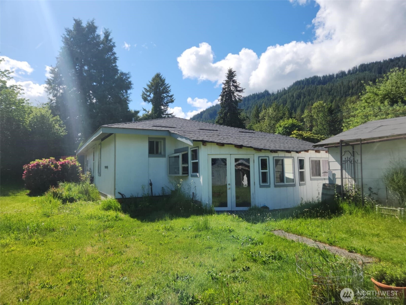 160 Gharet Road Randle, WA 98377 - Photo 19 of 26 a view of a house with a garden