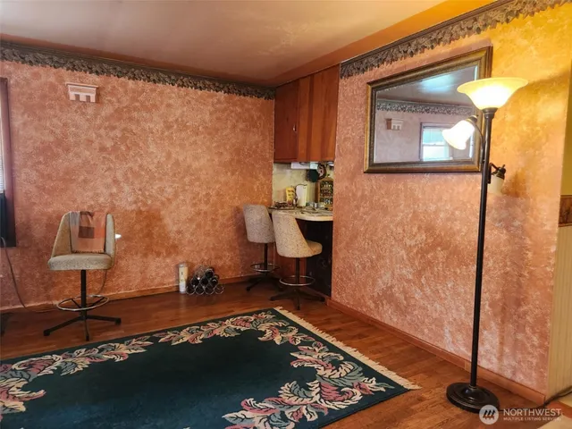 a room with furniture and a window