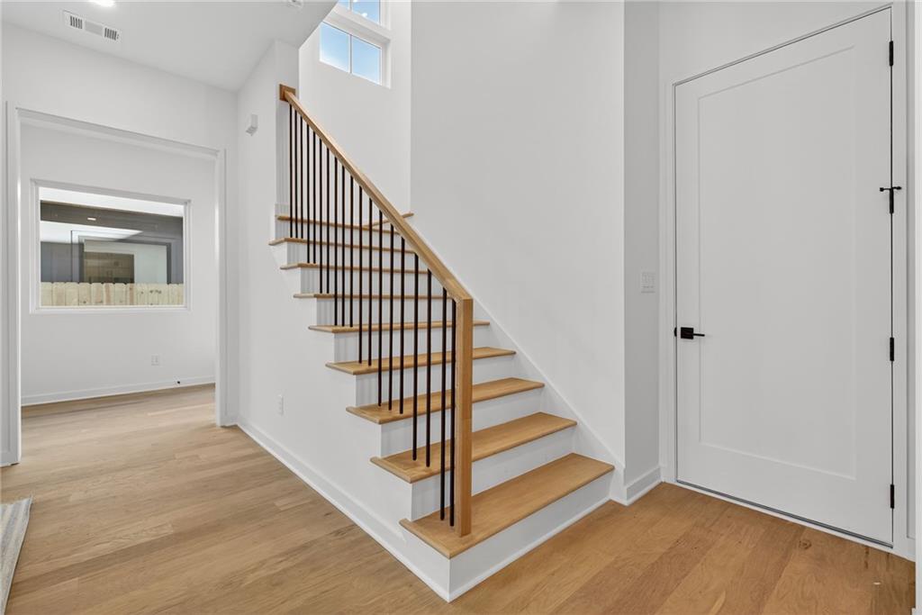 163 Walthall Street Southeast, Unit B Atlanta, GA 30316 - Photo 12 of 37 a view of a hallway with staircase