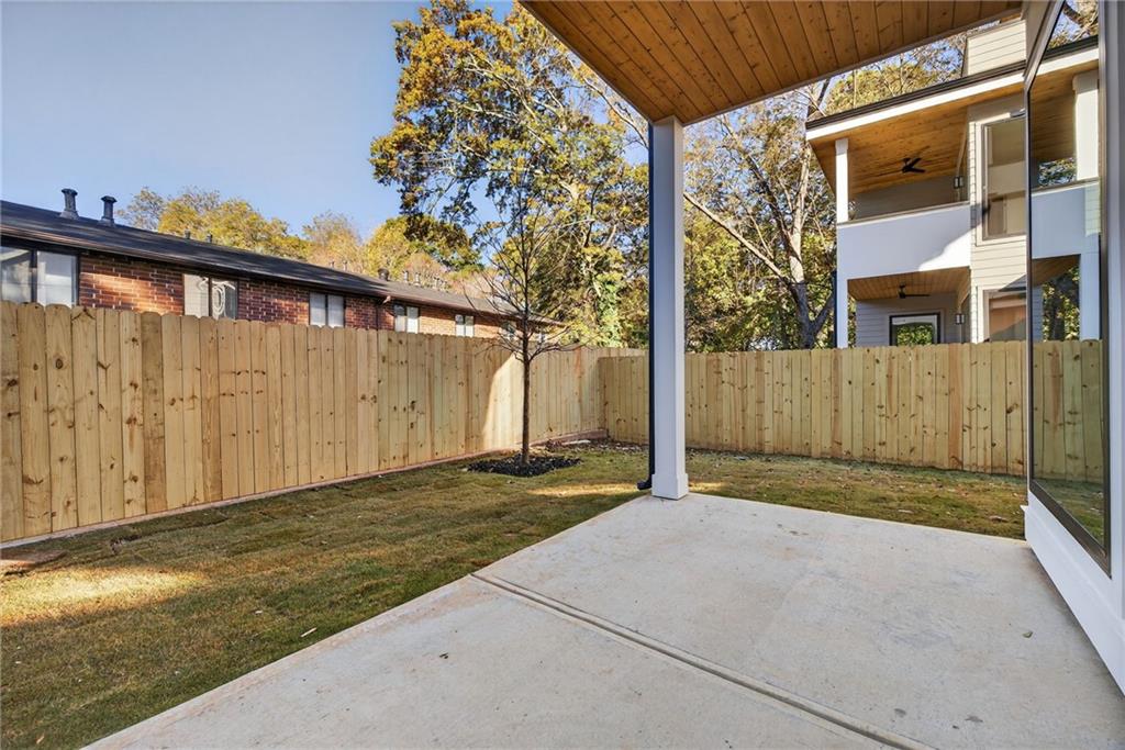 163 Walthall Street Southeast, Unit B Atlanta, GA 30316 - Photo 36 of 37 a view of backyard with large tree