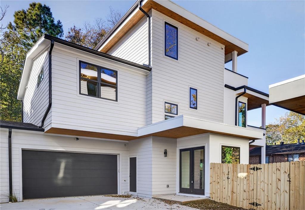 163 Walthall Street Southeast, Unit B Atlanta, GA 30316 - Photo 37 of 37 a front view of a house with a garage