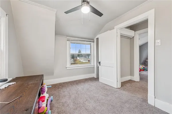 a view of an empty room and window