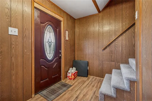 a front view of a house with wooden floor