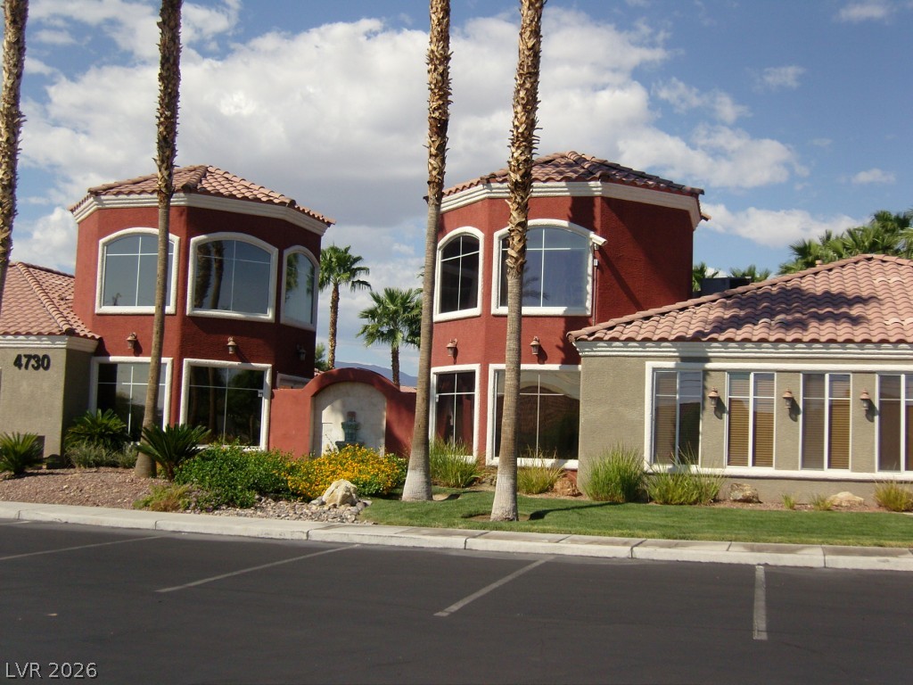 4730 East Craig Road, Unit 1073 Las Vegas, NV 89115 - Photo 14 of 18 Striking architectural towers and classic barrel tile roofs define this distinctive desert exterior.