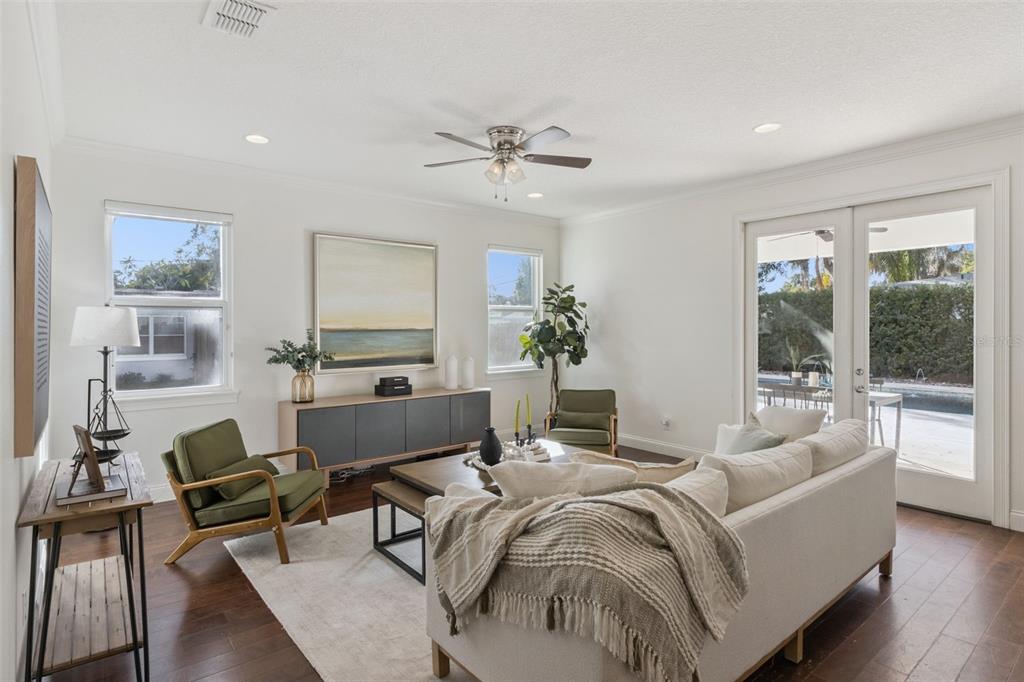 5018 Monet Avenue Belle Isle, FL 32812 - Photo 12 of 56 a living room with furniture and a large window