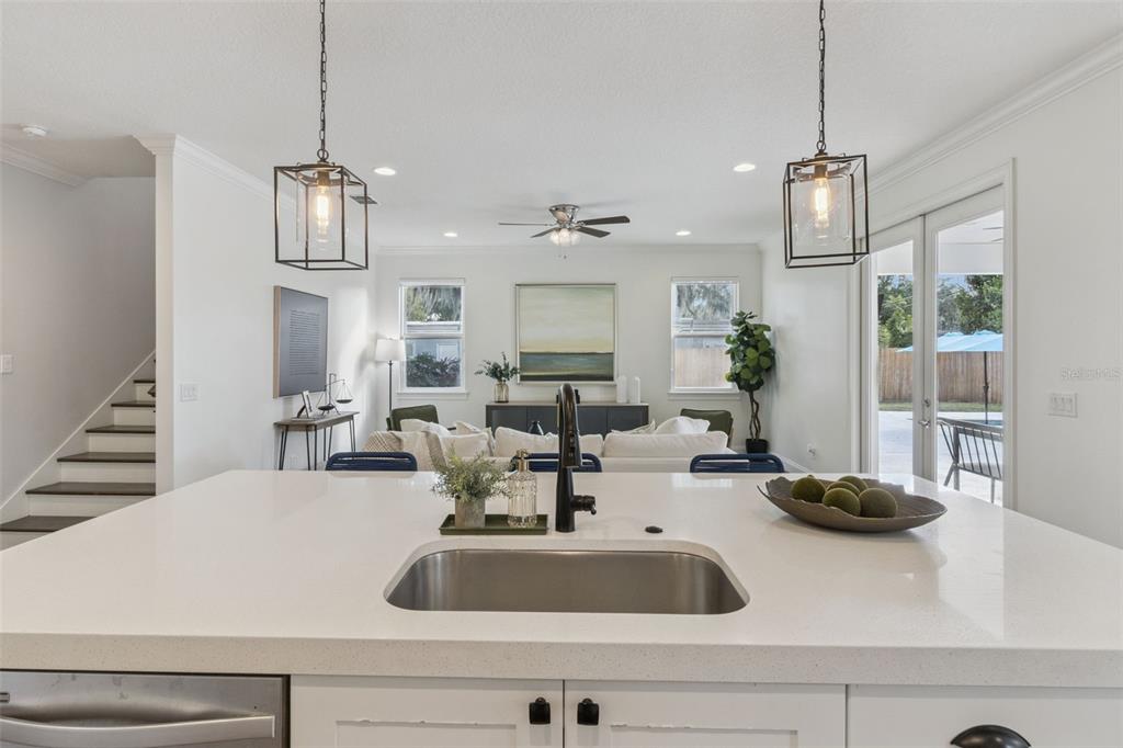 5018 Monet Avenue Belle Isle, FL 32812 - Photo 18 of 56 a view of kitchen with living room and living room view