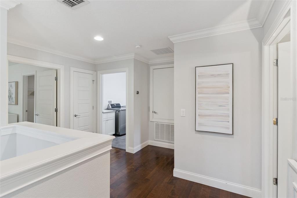 5018 Monet Avenue Belle Isle, FL 32812 - Photo 25 of 56 a bathroom with a tub shower hardwood and a sink