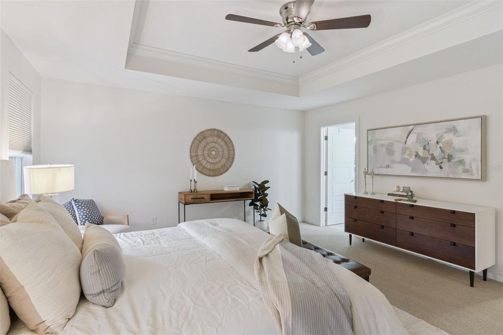 5018 Monet Avenue Belle Isle, FL 32812 - Photo 27 of 56 a bedroom with a bed and cabinet