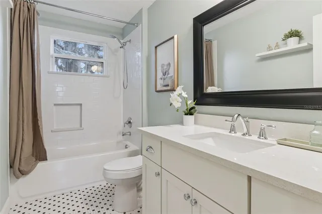 a view of balcony with wooden floor and outdoor seating