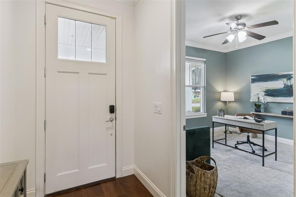 5018 Monet Avenue Belle Isle, FL 32812 - Photo 4 of 56 a view of a workspace with furniture and a bathroom