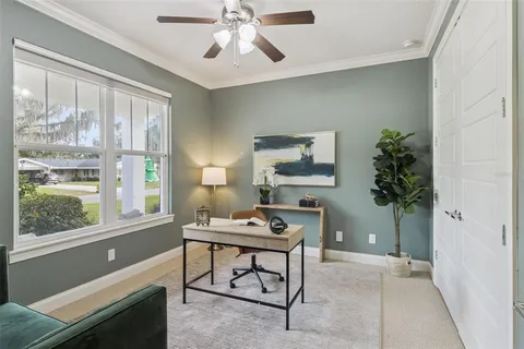 a living room with furniture and a window