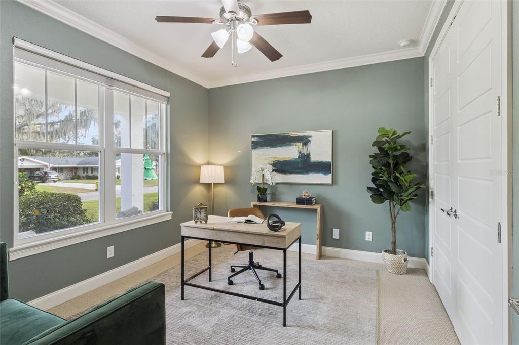 5018 Monet Avenue Belle Isle, FL 32812 - Photo 5 of 56 a living room with furniture and a window