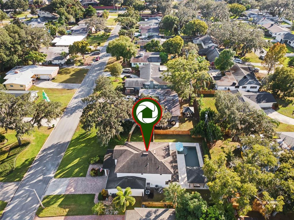 5018 Monet Avenue Belle Isle, FL 32812 - Photo 56 of 56 an aerial view of a house with a garden