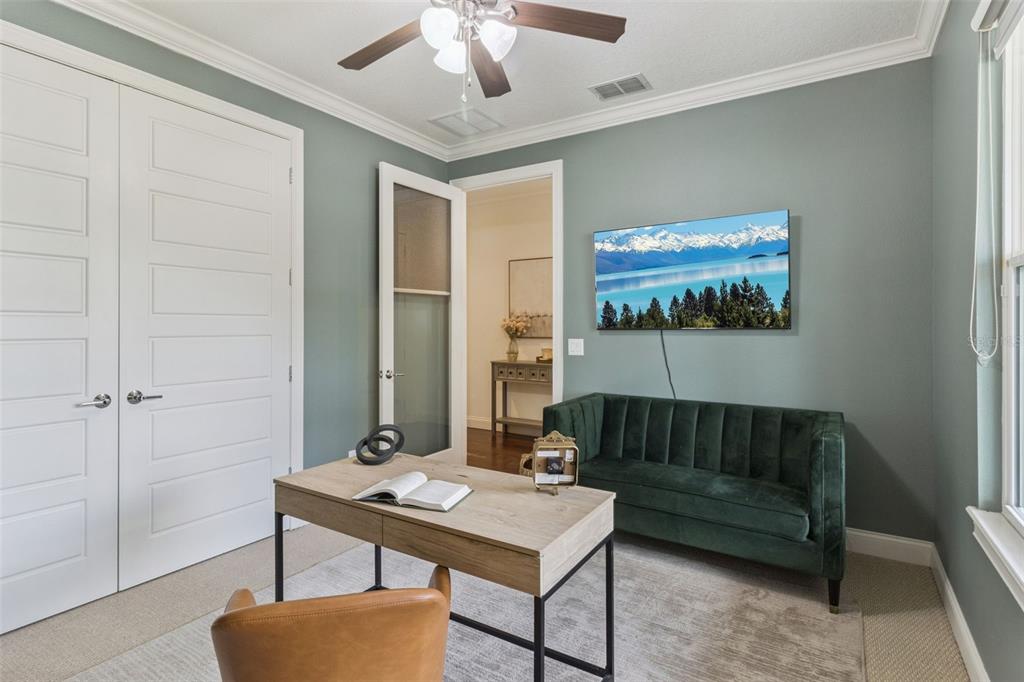 5018 Monet Avenue Belle Isle, FL 32812 - Photo 6 of 56 a living room with furniture and a wooden floor