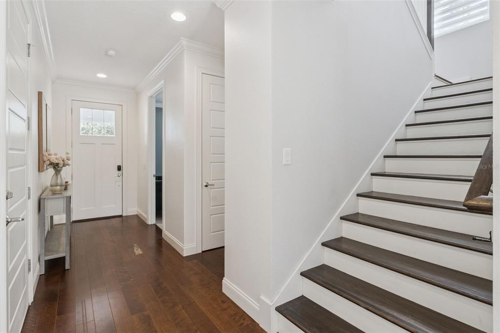 5018 Monet Avenue Belle Isle, FL 32812 - Photo 8 of 56 a view of entryway with wooden floor
