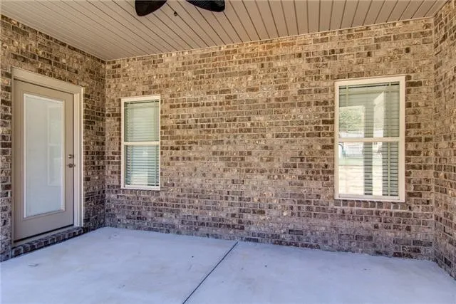 a view of entrance gate of a house