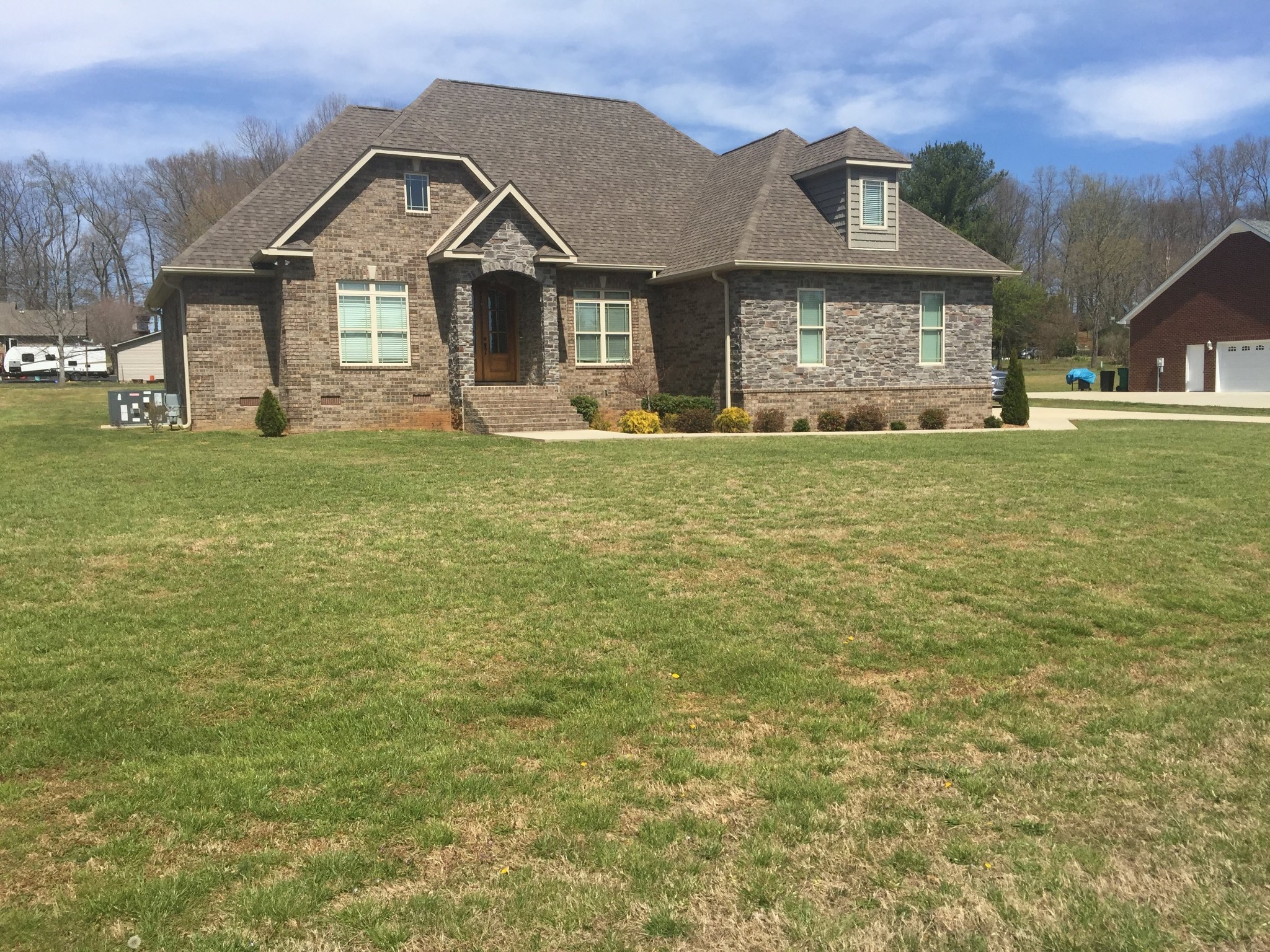 427 Favre Circle Winchester, TN 37398 - Photo 2 of 19 a front view of a house with a garden