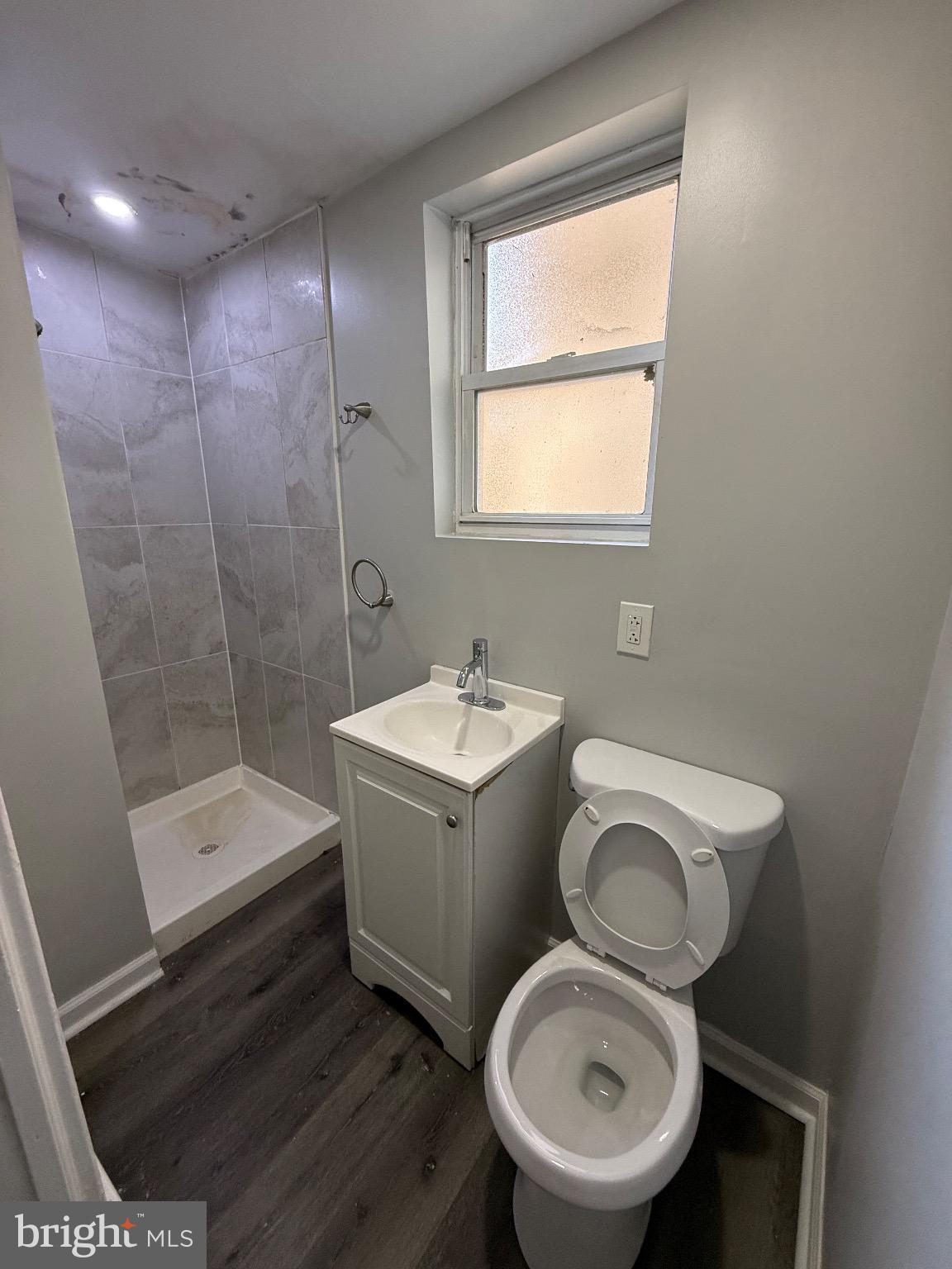 41 North Keystone Avenue Upper Darby, PA 19082 - Photo 14 of 15 a bathroom with a toilet sink and shower