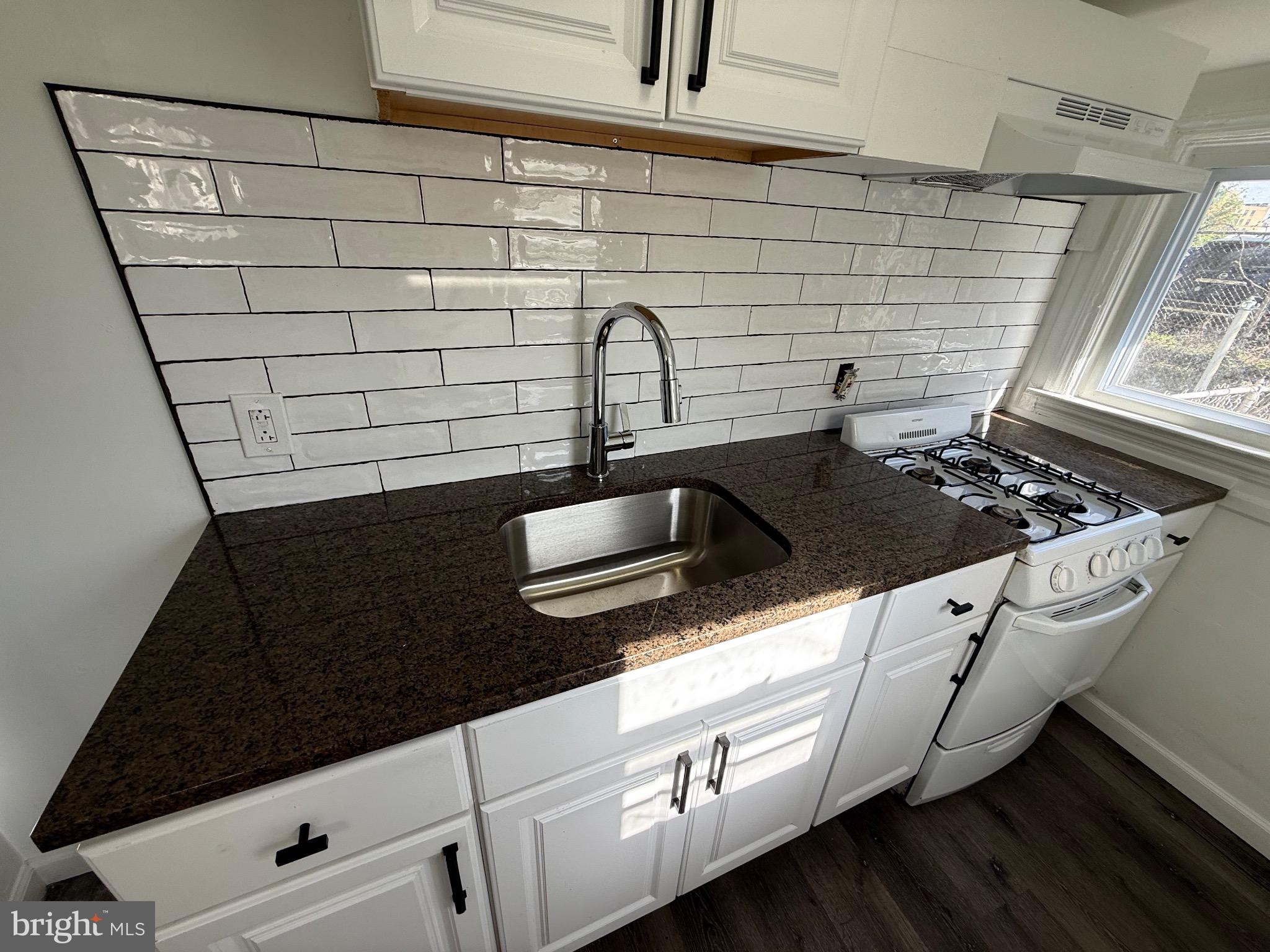 41 North Keystone Avenue Upper Darby, PA 19082 - Photo 5 of 15 a close view of sink and washing machine