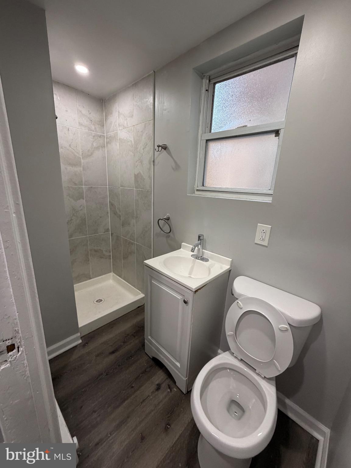 41 North Keystone Avenue Upper Darby, PA 19082 - Photo 9 of 15 a bathroom with a toilet sink and mirror